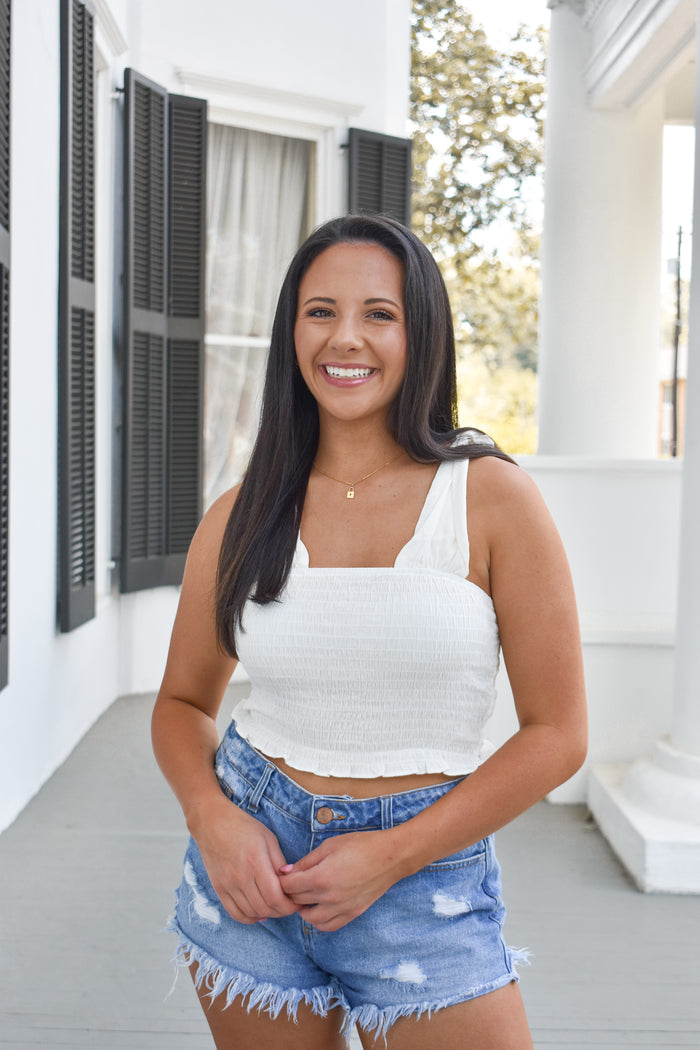 ivory smocked top perfect for spring and summer! 