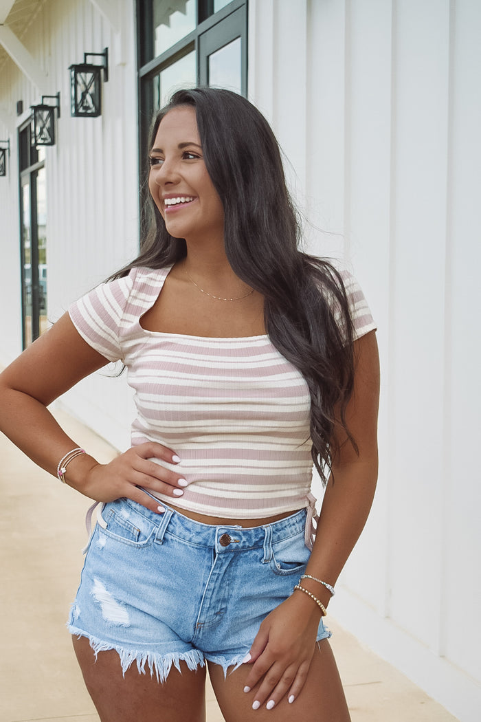 This is such a fun & pretty print in a blush & cream stripe, featuring a square neckline, and ruching on the sides!  