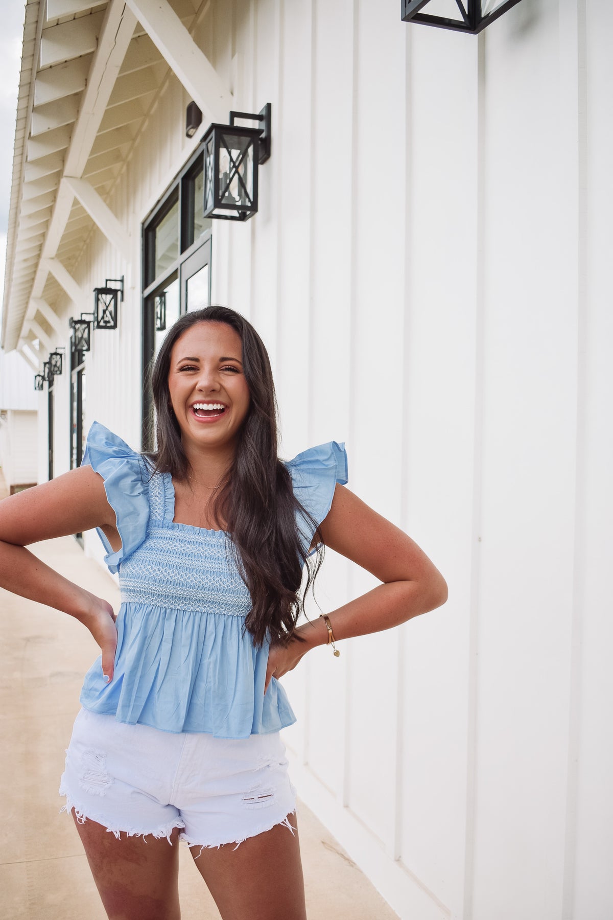 blue embroidered top ruffled sleeves 