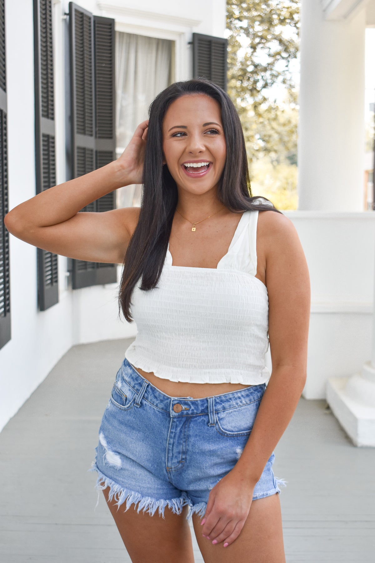 ivory smocked top perfect for spring and summer! 